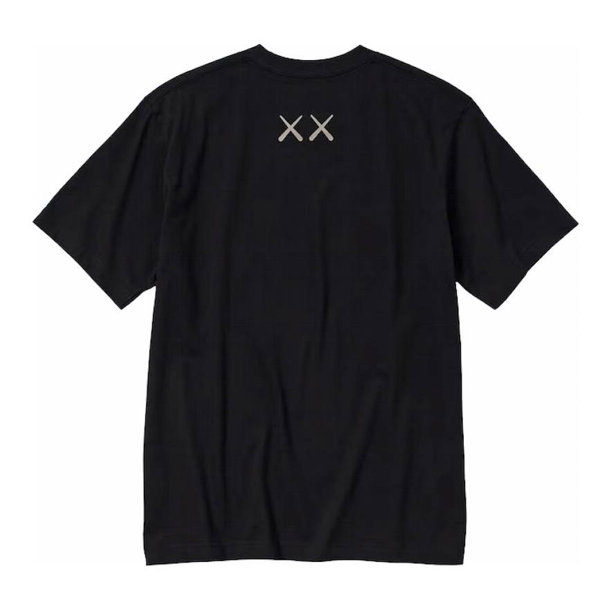 KAWS UT GRAPHIC T-SHIRT BLACK by Kaws in Clothing. Available at KershKicks for £42.00. A must-have for fans of Kaws looking to elevate their style with this T-Shirt.