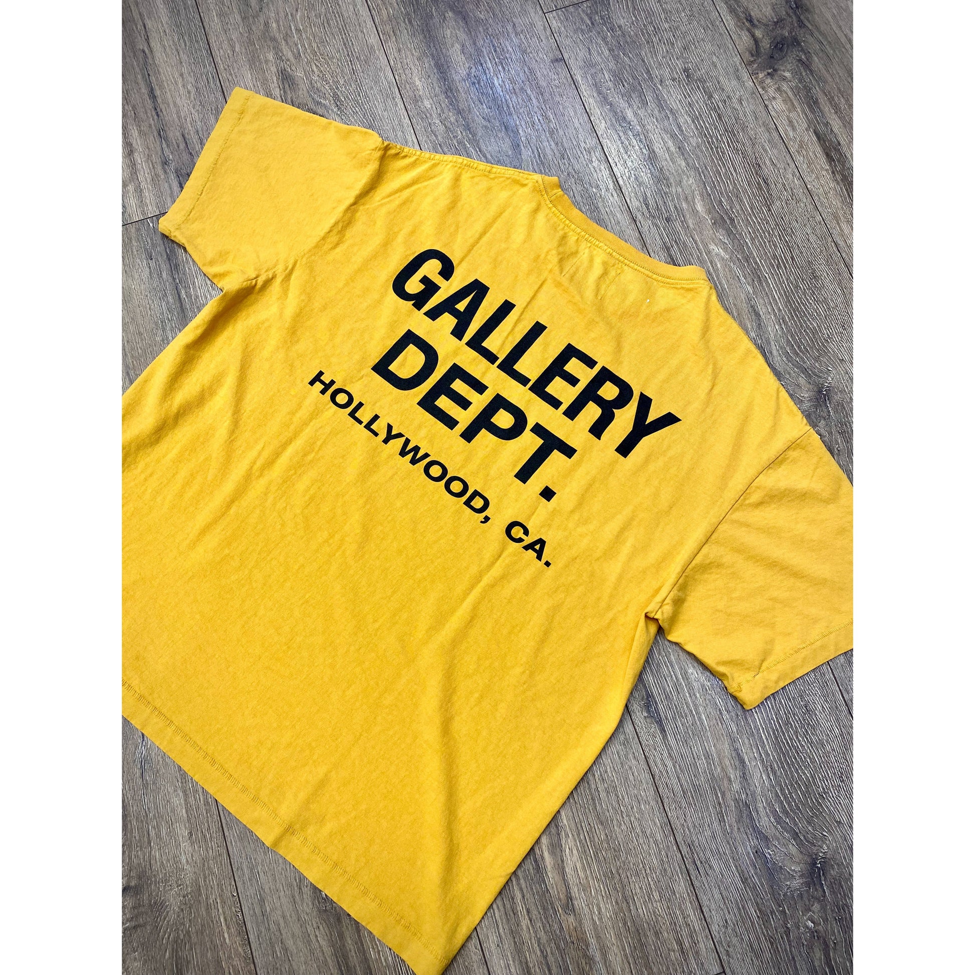 Gallery Dept. Vintage Souvenir T-Shirt Yellow by GALLERY DEPT. in Uncategorized. Available at KershKicks for £250.00. A must-have for fans of GALLERY DEPT. looking to elevate their style with this T-Shirt.