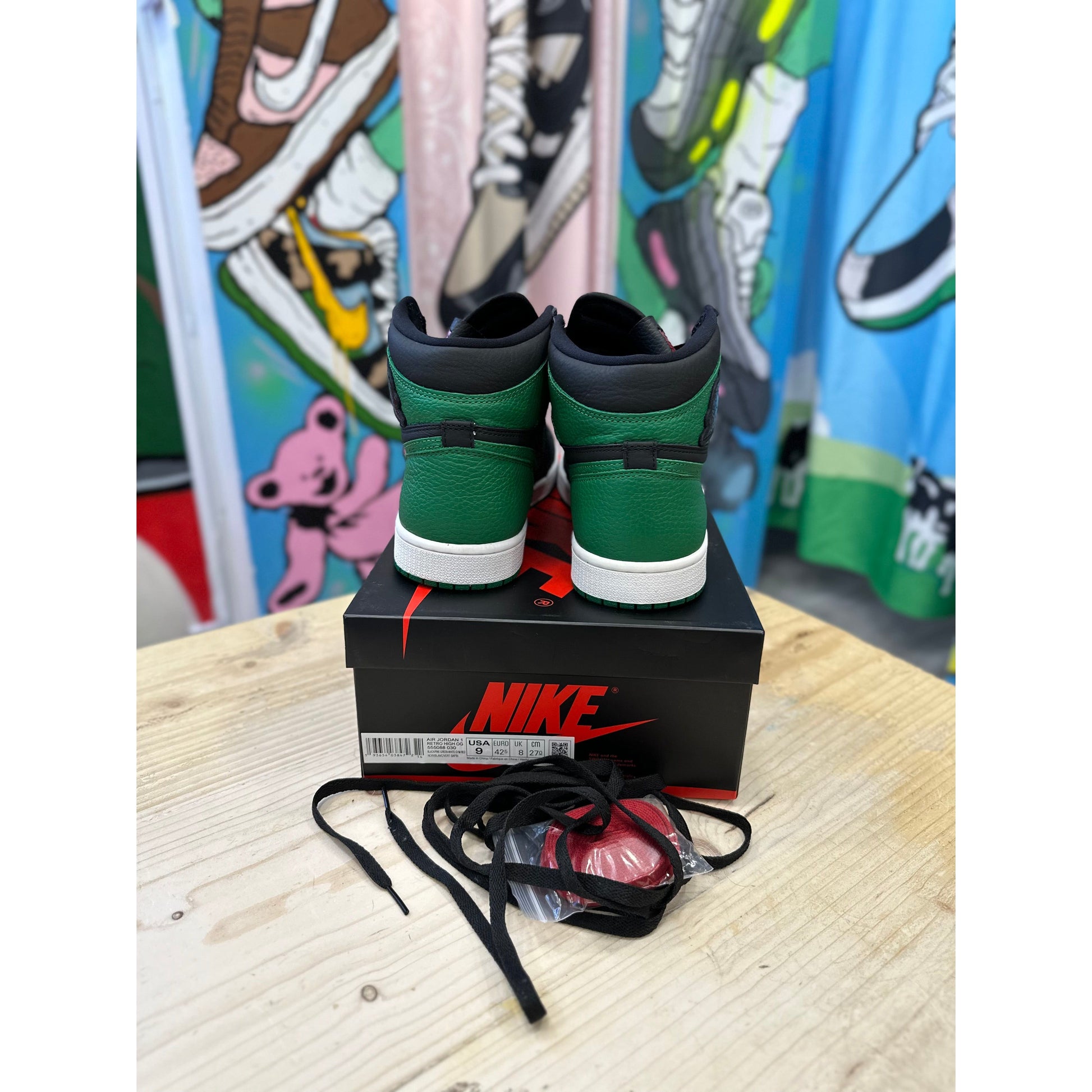 black jordans with green