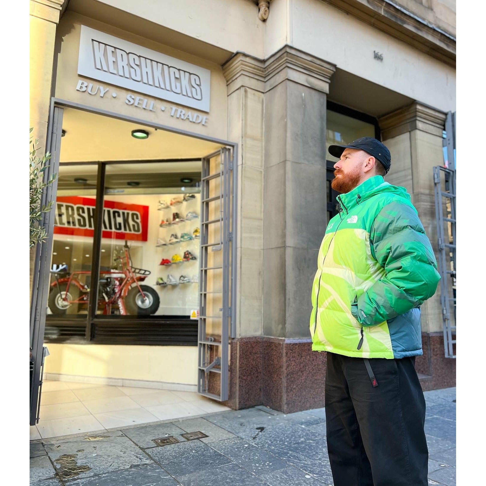 KAWS x The North Face Retro 1996 Nuptse Jacket Safety Green by Kaws in Clothing. Available at KershKicks for £300.00. A must-have for fans of Kaws looking to elevate their style with this Jacket.