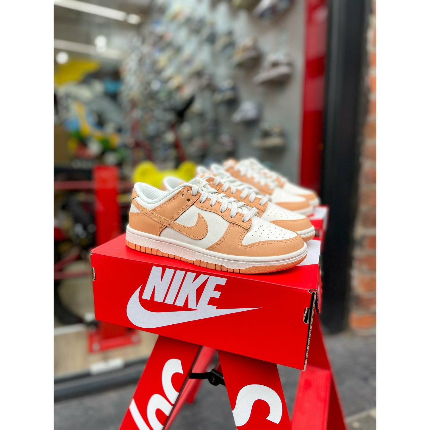 Nike Dunk Low Harvest Moon (W) by Nike in Shoes. Available at KershKicks for £145.00. A must-have for fans of Nike looking to elevate their style with this Shoes.