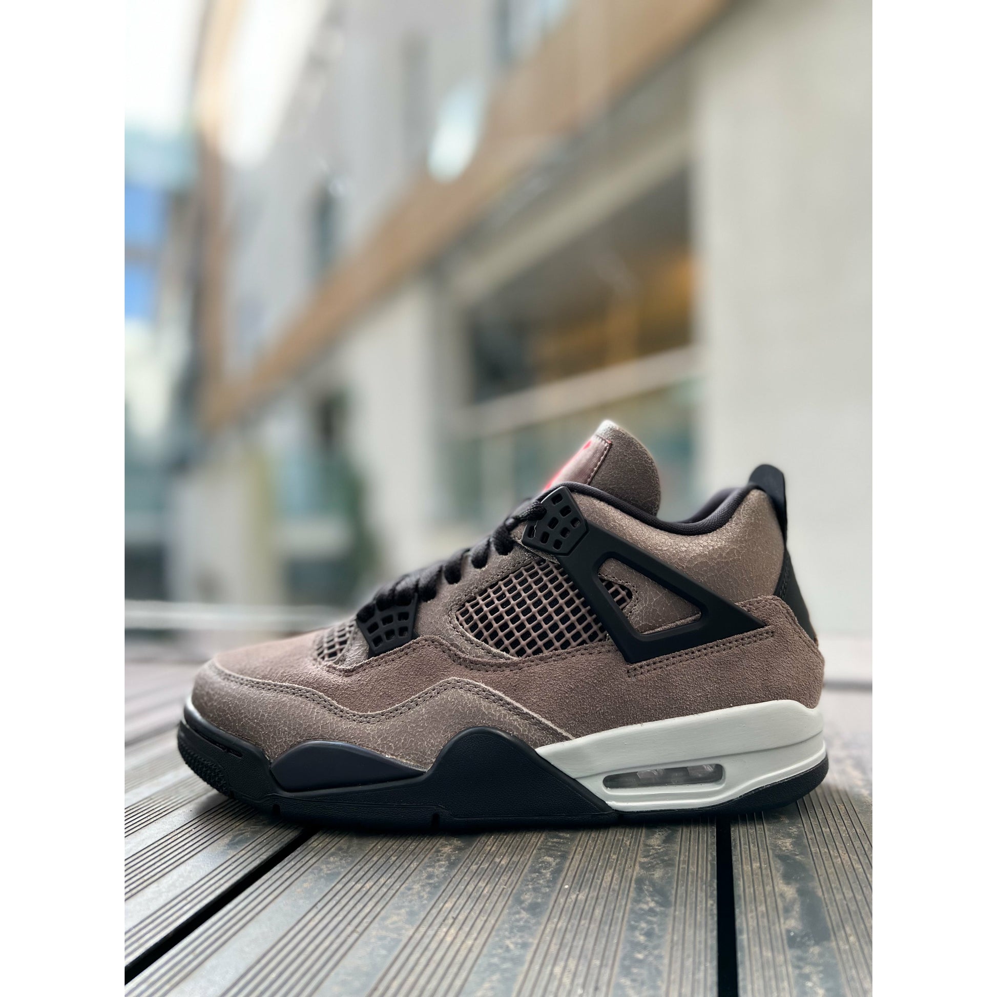 Jordan 4 Retro Taupe Haze by Jordan's in Shoes. Available at KershKicks for £485.00. A must-have for fans of Jordan's looking to elevate their style with this Shoes.