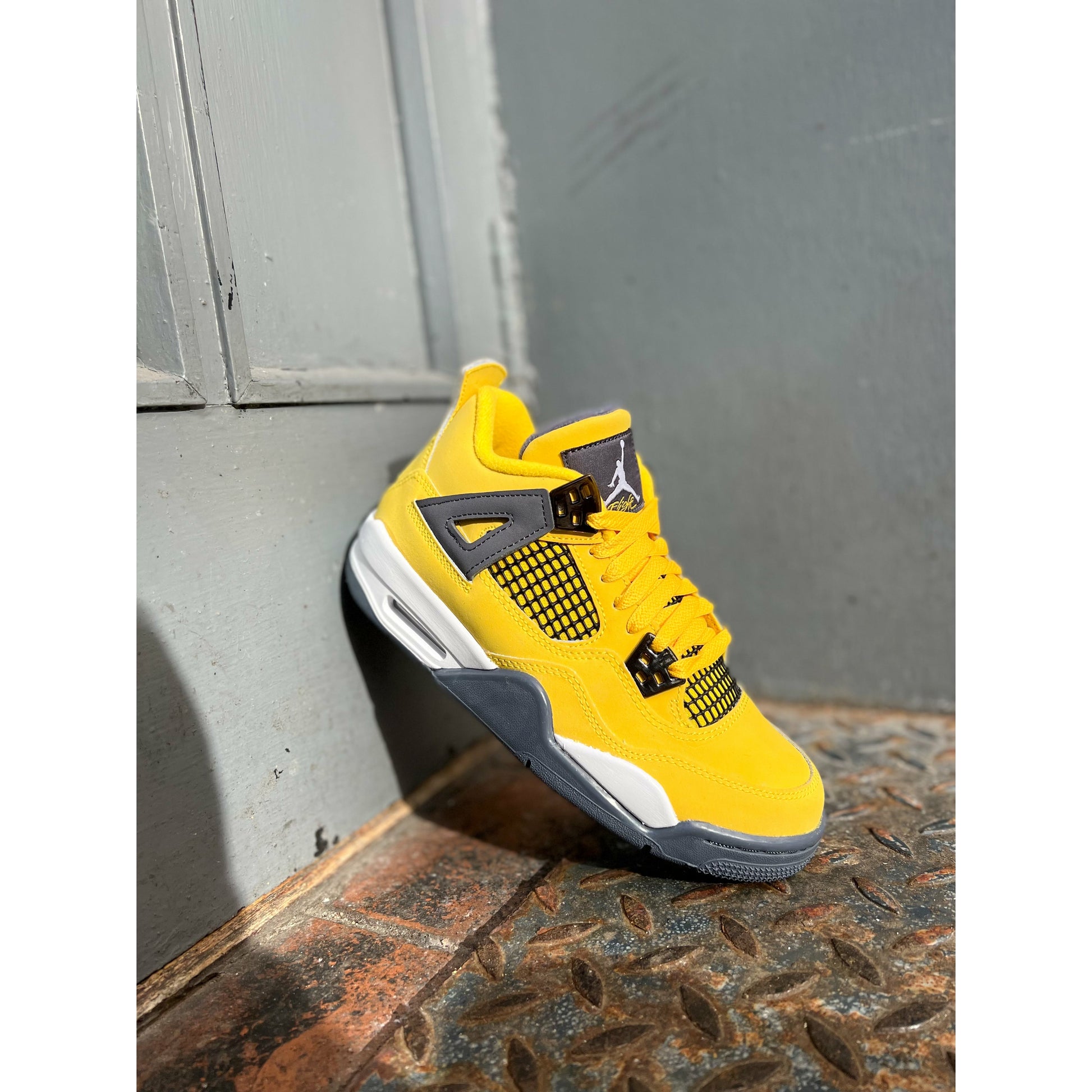 Jordan 4 Retro Lightning (2021) by Jordan's in Shoes. Available at KershKicks for £355.00. A must-have for fans of Jordan's looking to elevate their style with this Shoes.