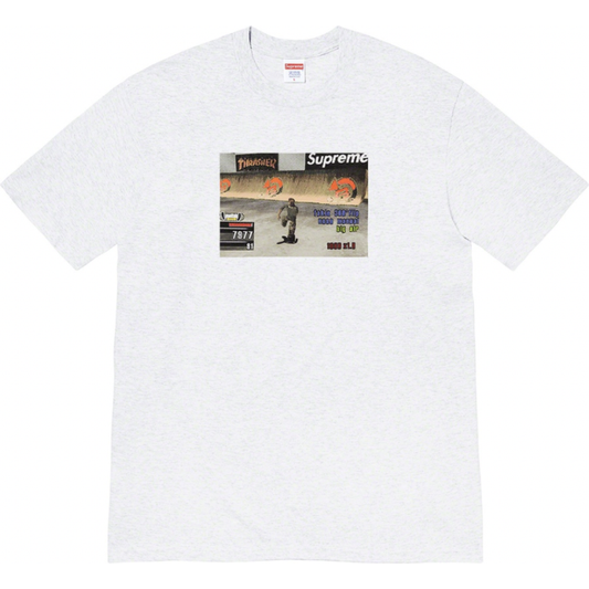 Supreme®/Thrasher® Game Tee Ash by Supreme in . Available at KershKicks for £95.00. A must-have for fans of Supreme looking to elevate their style with this T-Shirt.