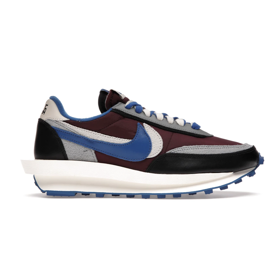 Nike LDWaffle Sacai Undercover Night Maroon Team Royal by Nike in Shoes. Available at KershKicks for £195.00. A must-have for fans of Nike looking to elevate their style with this Shoes.