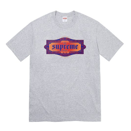 Supreme Top Shotta Tee Heather Grey by Supreme in . Available at KershKicks for £95.00. A must-have for fans of Supreme looking to elevate their style with this T-Shirt.