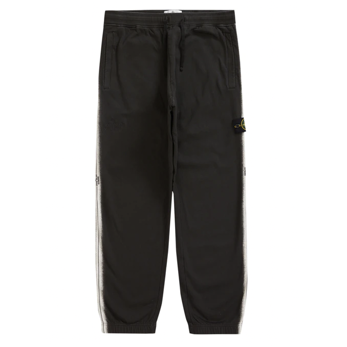 Supreme Stone Island Stripe Sweatpant Black by Supreme in Sweatpants. Available at KershKicks for £350.00. A must-have for fans of Supreme looking to elevate their style with this Sweatpants.