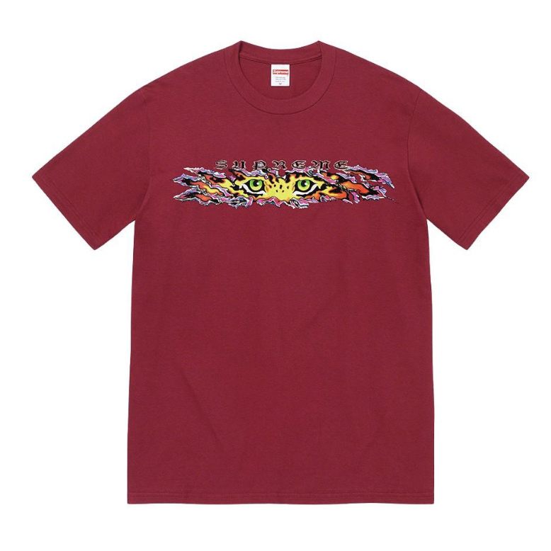 Supreme Eyes Tee Cardinal by Supreme in . Available at KershKicks for £90.00. A must-have for fans of Supreme looking to elevate their style with this T-Shirt.