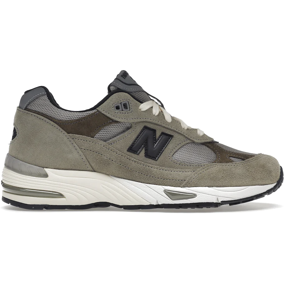 New Balance 991 MiUK JJJJound Grey Olive by New Balance in Shoes. Available at KershKicks for £345.00. A must-have for fans of New Balance looking to elevate their style with this Shoes.