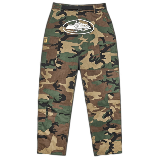 Corteiz Guerillaz* Cargos Woodland Camo by Corteiz in Track Pants. Available at KershKicks for £225.00. A must-have for fans of Corteiz looking to elevate their style with this Track Pants.