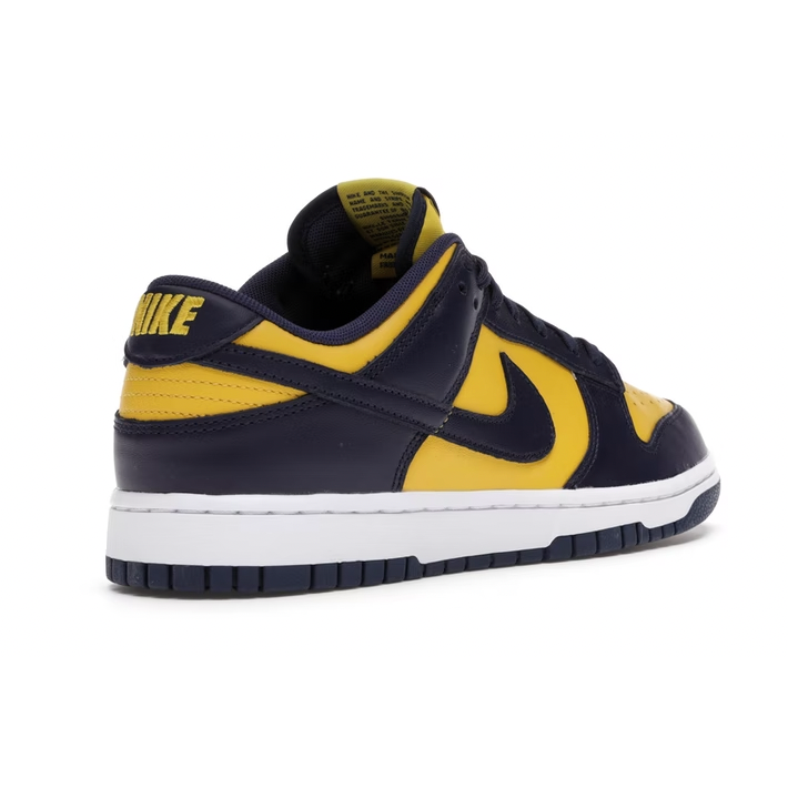 Nike Dunk Low Michigan (2021/2023) (GS) by Nike in Shoes. Available at KershKicks for £135.00. A must-have for fans of Nike looking to elevate their style with this Shoes.