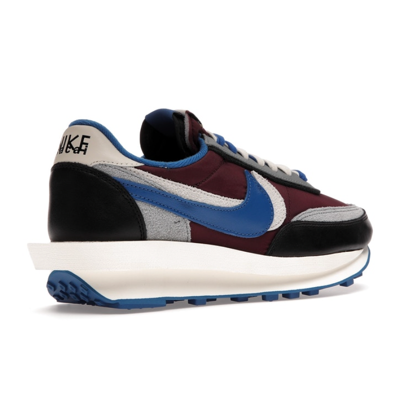 Nike LDWaffle Sacai Undercover Night Maroon Team Royal by Nike in Shoes. Available at KershKicks for £195.00. A must-have for fans of Nike looking to elevate their style with this Shoes.