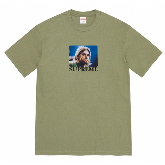Supreme Kurt Cobain Tee Light Olive by Supreme in Clothing. Available at KershKicks for £85.00. A must-have for fans of Supreme looking to elevate their style with this T-Shirt.