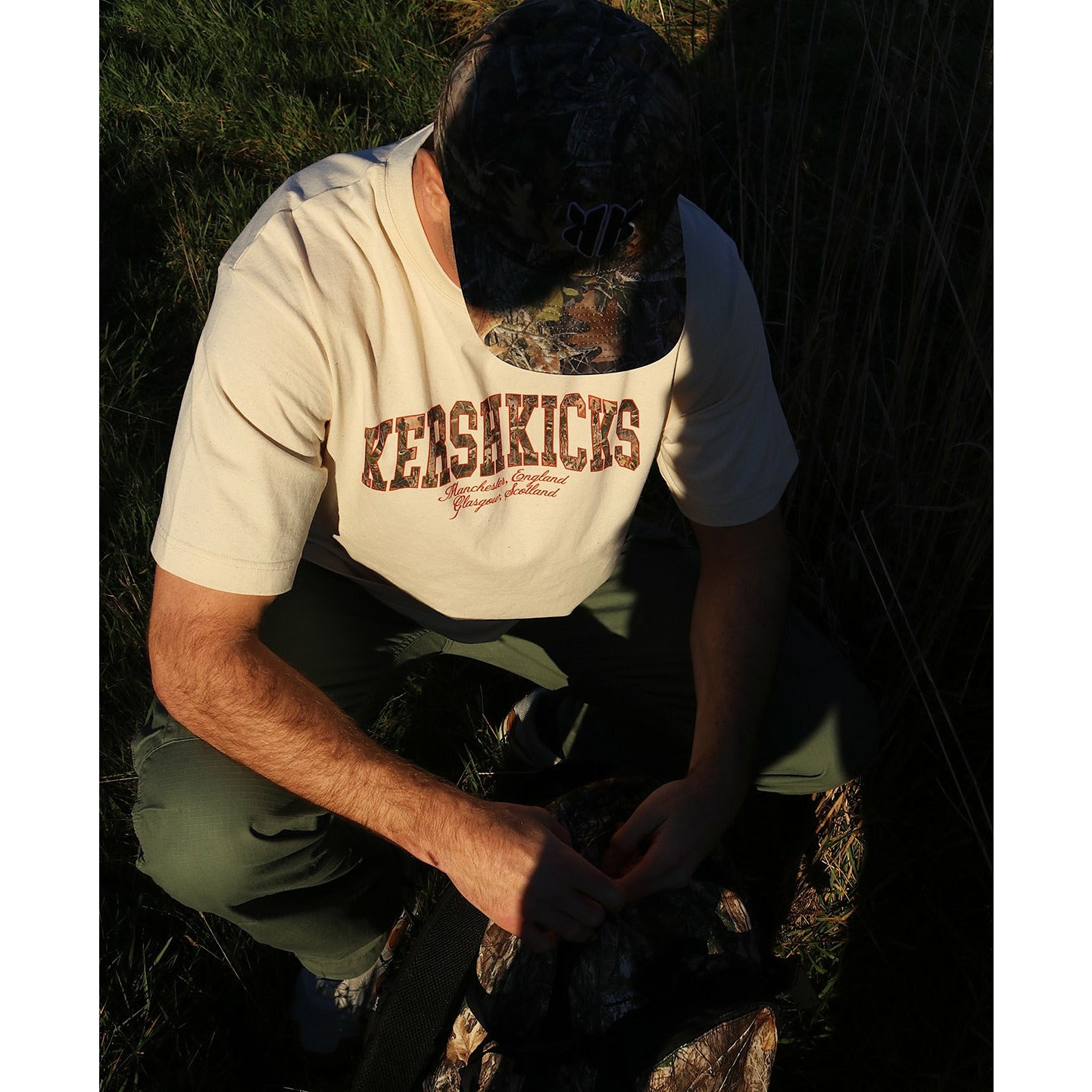 KERSHKICKS CAMO TEE by KershKicks in . Available at KershKicks for £30.00. A must-have for fans of KershKicks looking to elevate their style with this T-Shirt.