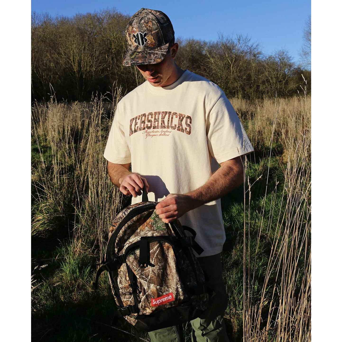 KERSHKICKS CAMO TEE by KershKicks in . Available at KershKicks for £30.00. A must-have for fans of KershKicks looking to elevate their style with this T-Shirt.