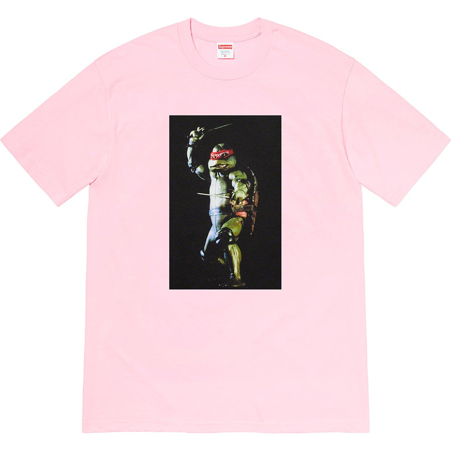 Supreme Raphael Tee Light Pink by Supreme in . Available at KershKicks for £85.00. A must-have for fans of Supreme looking to elevate their style with this T-Shirt.