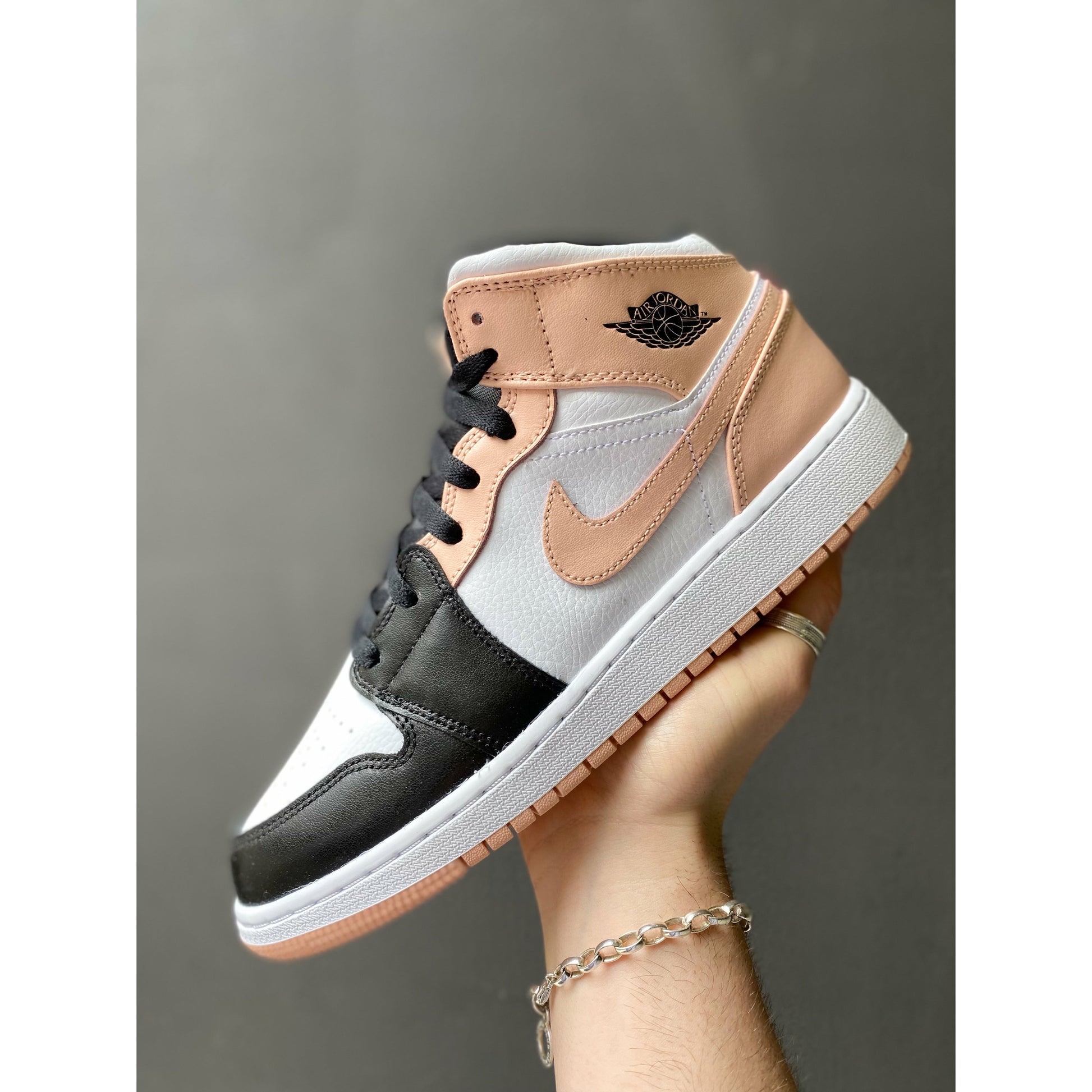 Jordan 1 Mid Crimson Tint Toe (GS) by Jordan's in Shoes. Available at KershKicks for £195.00. A must-have for fans of Jordan's looking to elevate their style with this Shoes.