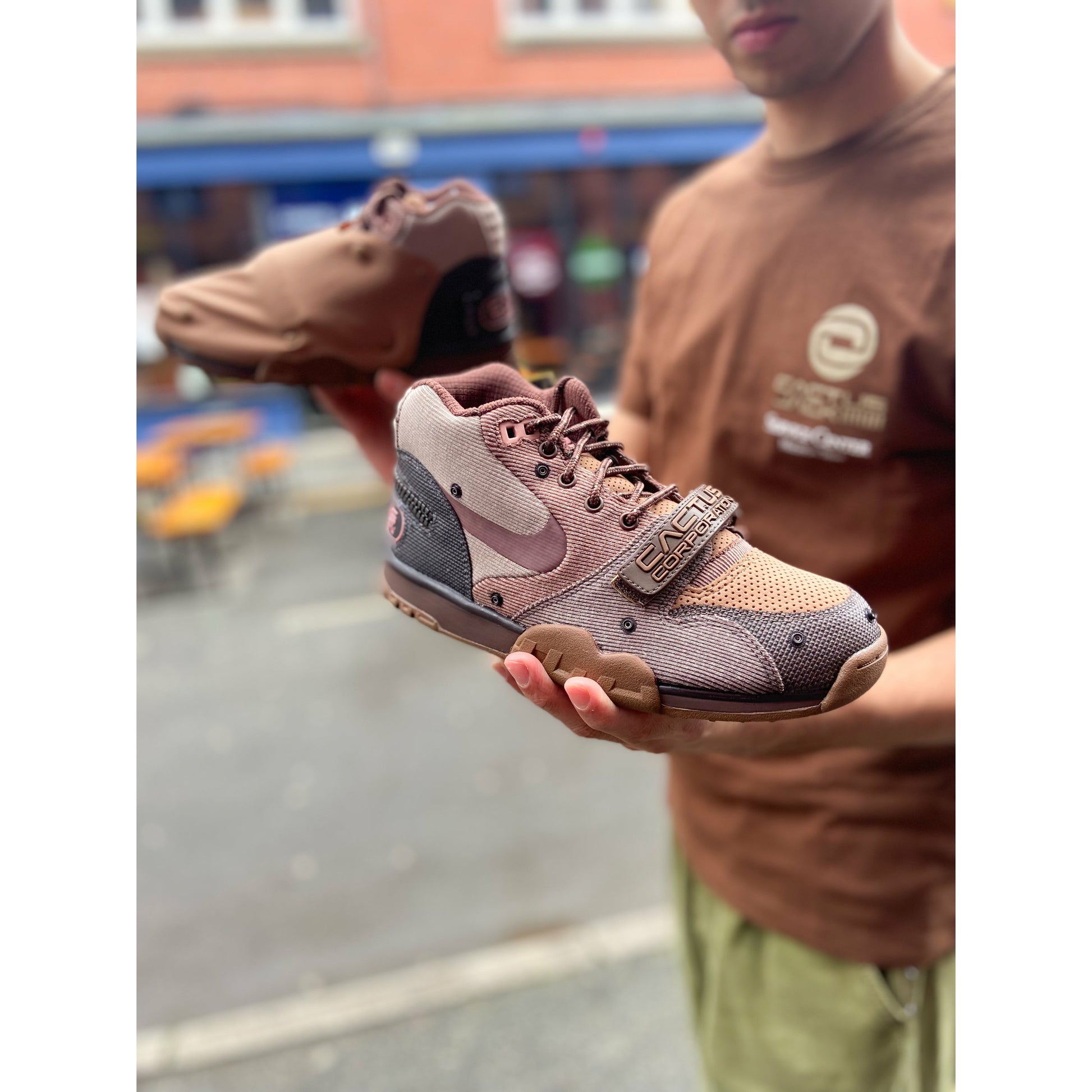 Nike Air Trainer 1 SP Travis Scott Wheat by Nike in Shoes. Available at KershKicks for £110.00. A must-have for fans of Nike looking to elevate their style with this Shoes.