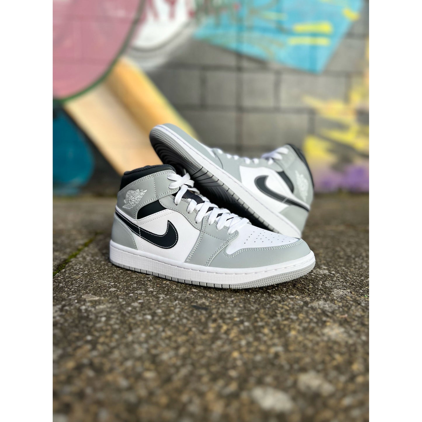 Jordan 1 Mid Light Smoke Grey Anthracite (GS) by Jordan's in Shoes. Available at KershKicks for £195.00. A must-have for fans of Jordan's looking to elevate their style with this Shoes.