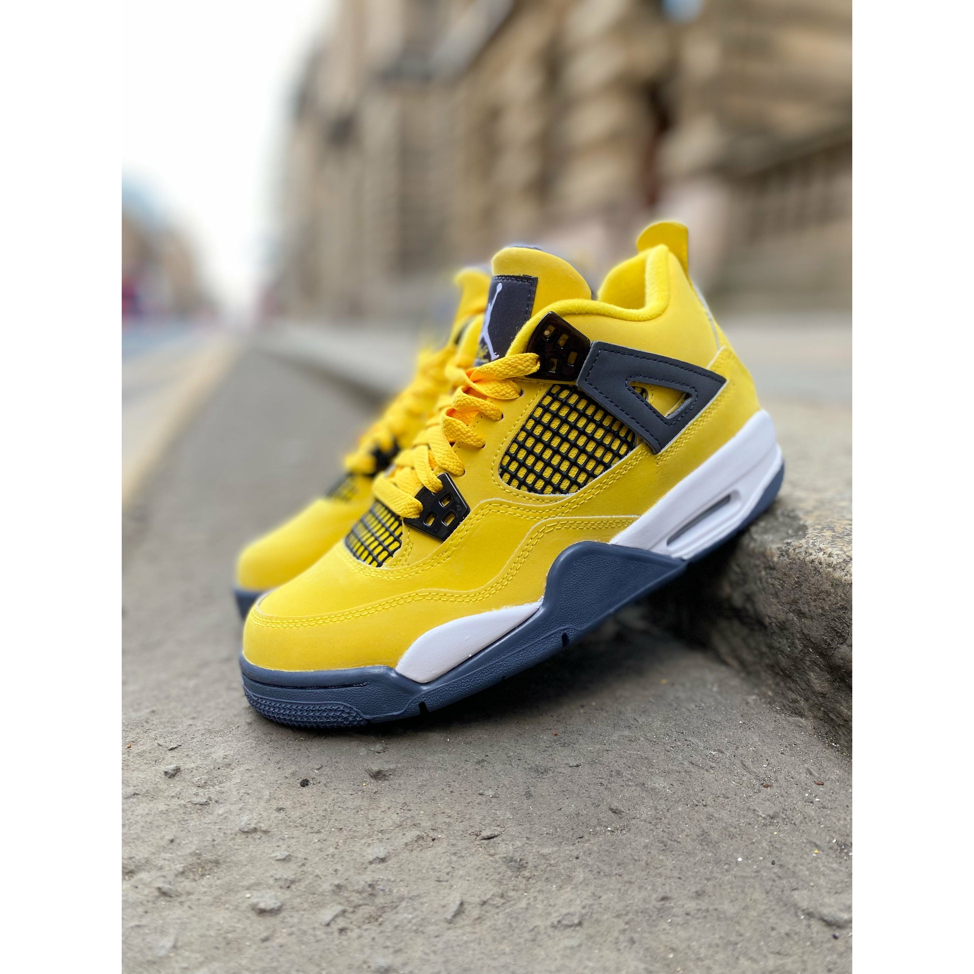 Jordan 4 Retro Lightning GS (2021) by Jordan's in Shoes. Available at KershKicks for £235.00. A must-have for fans of Jordan's looking to elevate their style with this Shoes.
