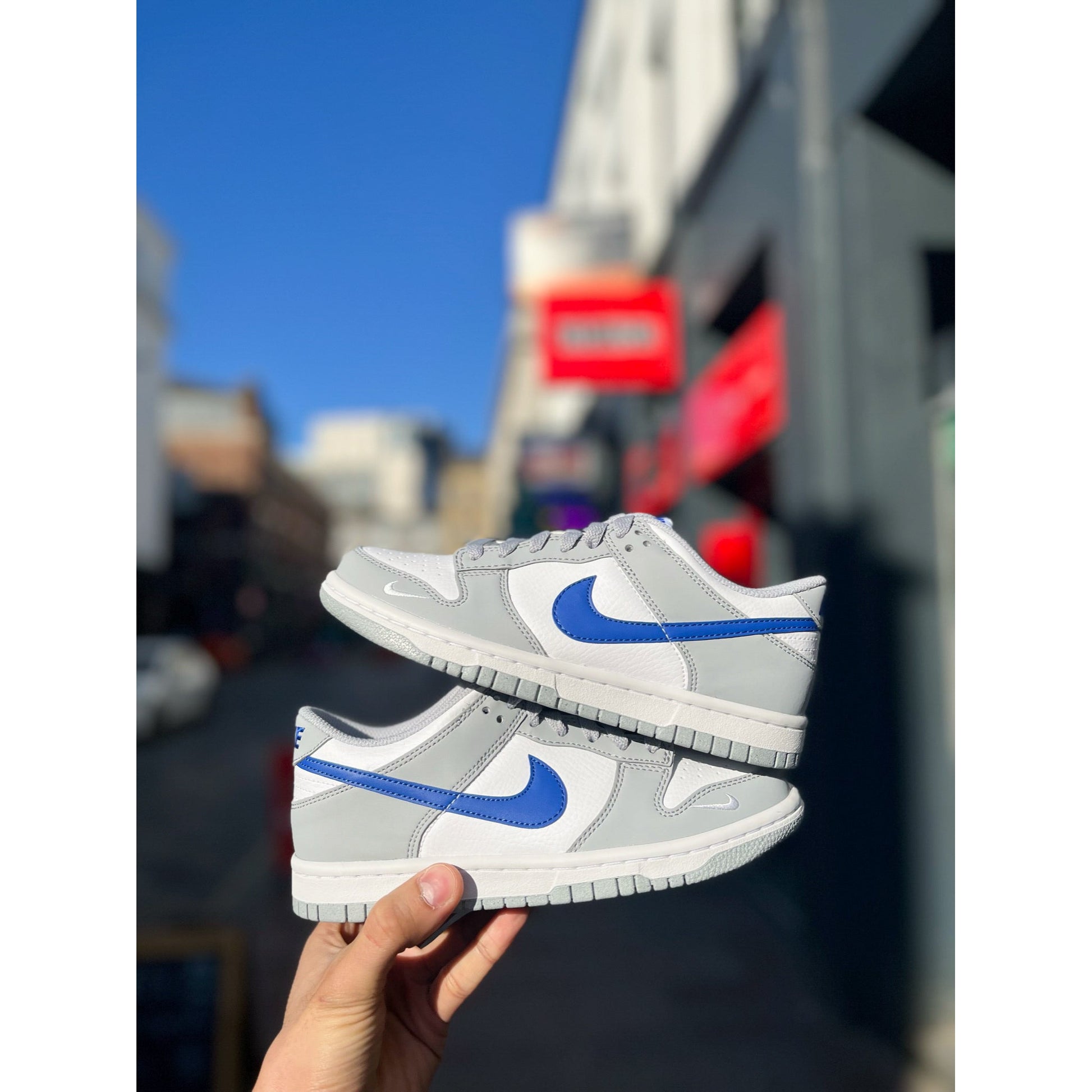 Nike Dunk Low Mini Swoosh Wolf Grey Game Royal (GS) by Nike in Shoes. Available at KershKicks for £110.00. A must-have for fans of Nike looking to elevate their style with this Shoes.