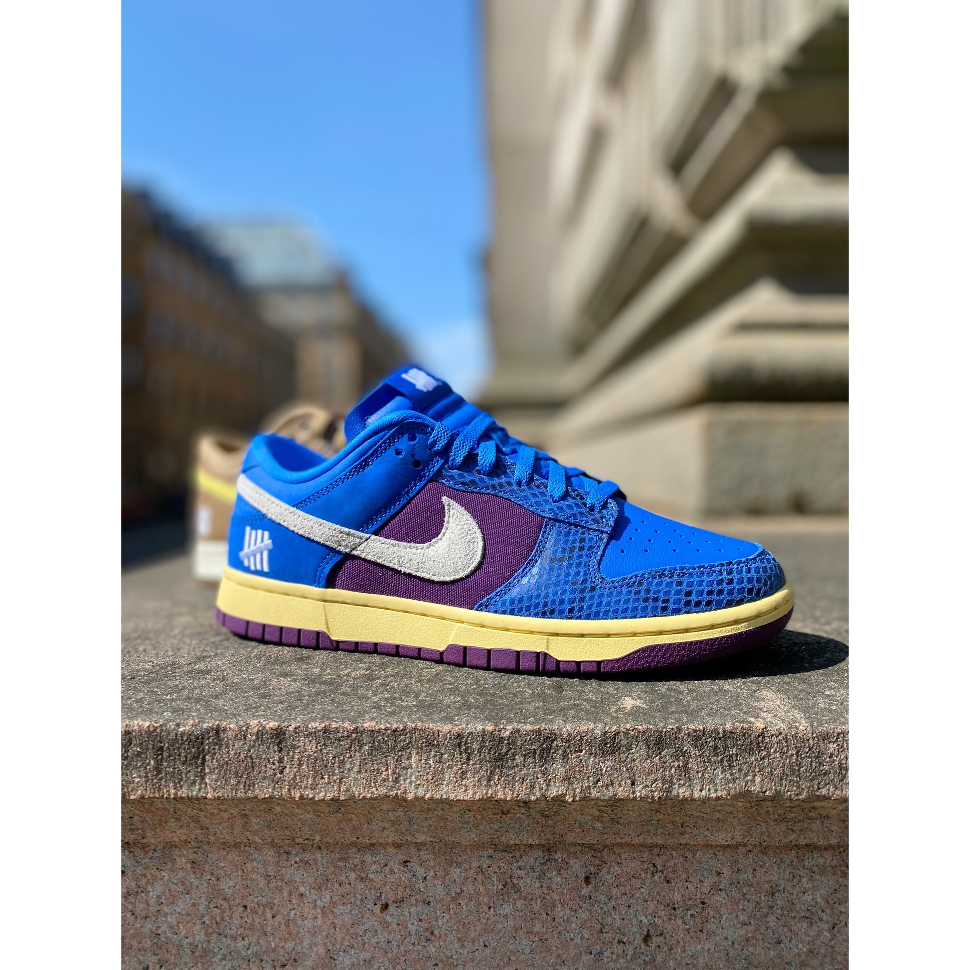 Nike Dunk Low Undefeated 5 On It Dunk vs. AF1 by Nike in Shoes. Available at KershKicks for £185.00. A must-have for fans of Nike looking to elevate their style with this Shoes.