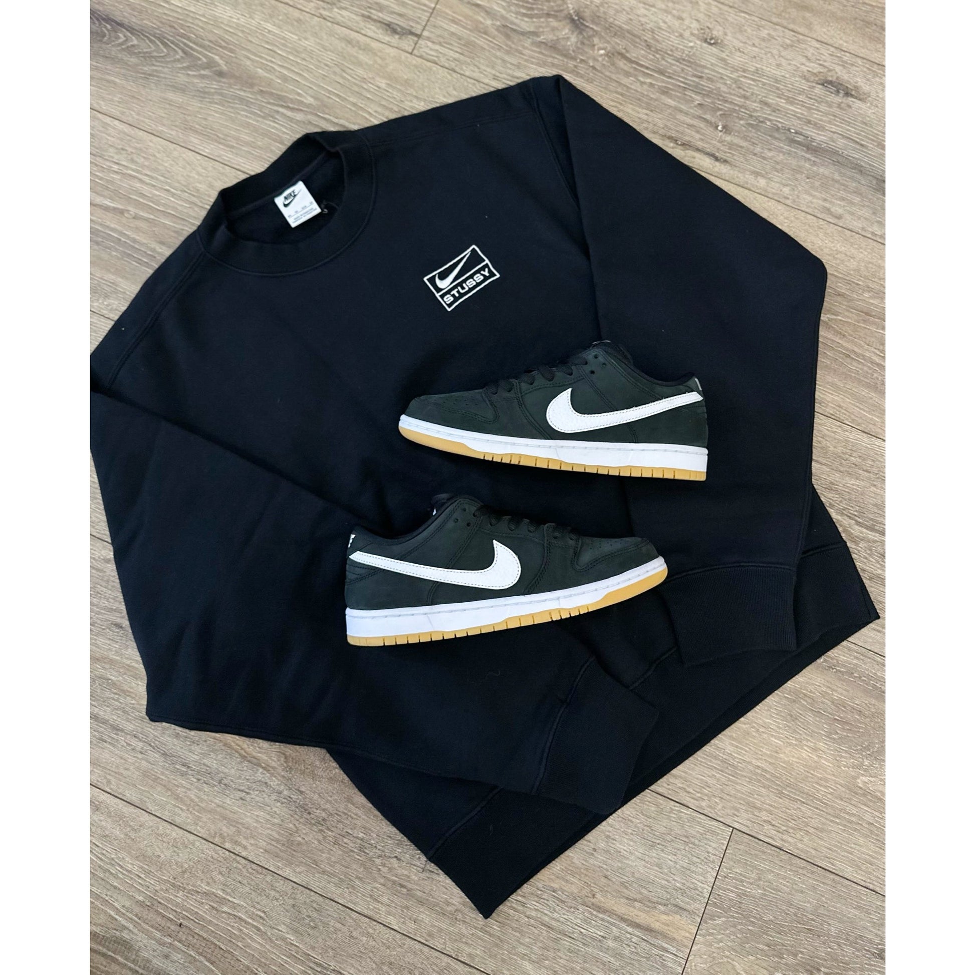 Nike x Stussy Wash Crew Fleece Black (SS23) by Nike in Clothing. Available at KershKicks for £165.00. A must-have for fans of Nike looking to elevate their style with this Crewneck.