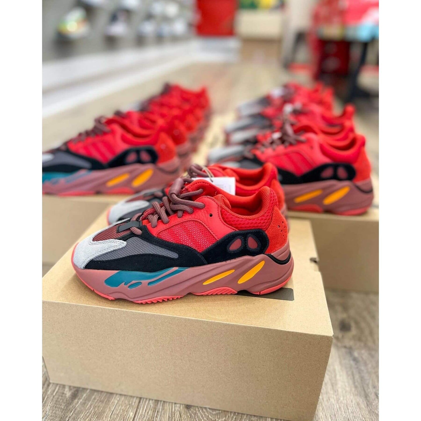 adidas Yeezy Boost 700 Hi-Res Red by Yeezy in Shoes. Available at KershKicks for £300.00. A must-have for fans of Yeezy looking to elevate their style with this Shoes.